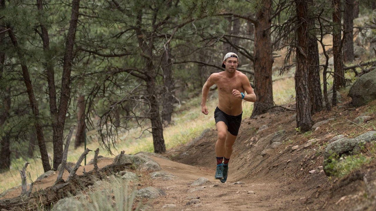 Man Running on Trail